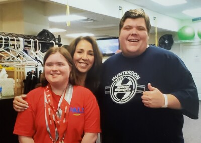 Janet Rollero with athletes