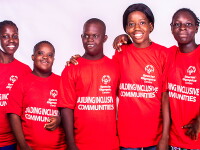 A group of Special Olympics Gambia athletes pose together.