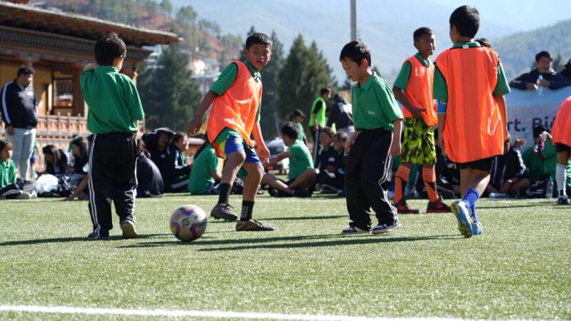 Athletes playing bocce. 