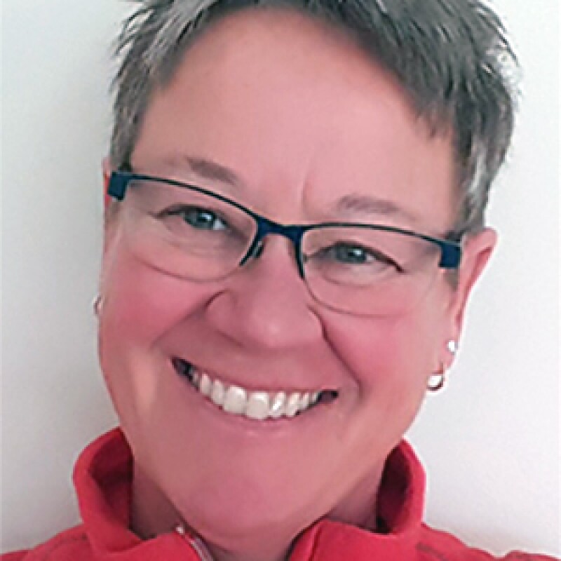 Diane Vander Kooy smiling for a portait photo