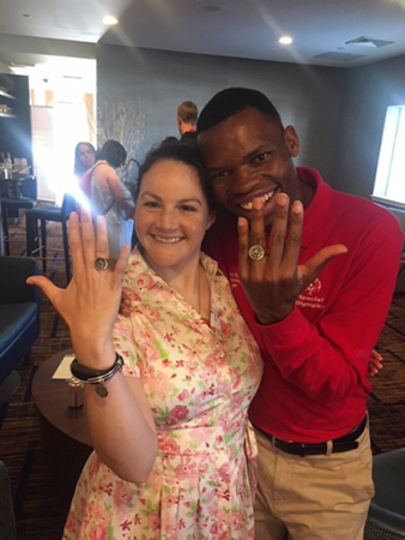Renee and Nyasha Derera show off their matching rings.