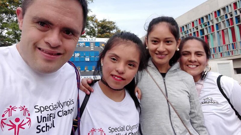 Jaime Cruz at a Special Olympics Unified Schools event in Peru with three other athletes.