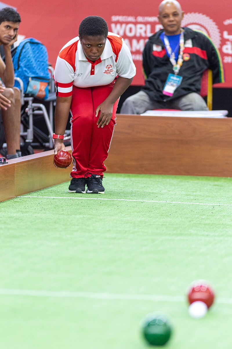 Athlete playing bocce.