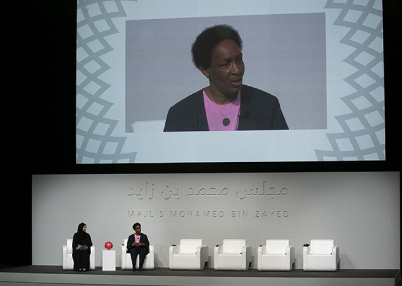 Loretta on stage speaking