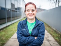 Special Olympics Romania athlete Anca Miron poses with an ear-to-ear smile