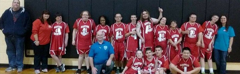 Coed Basketball team photo, with Amber at the far right. 