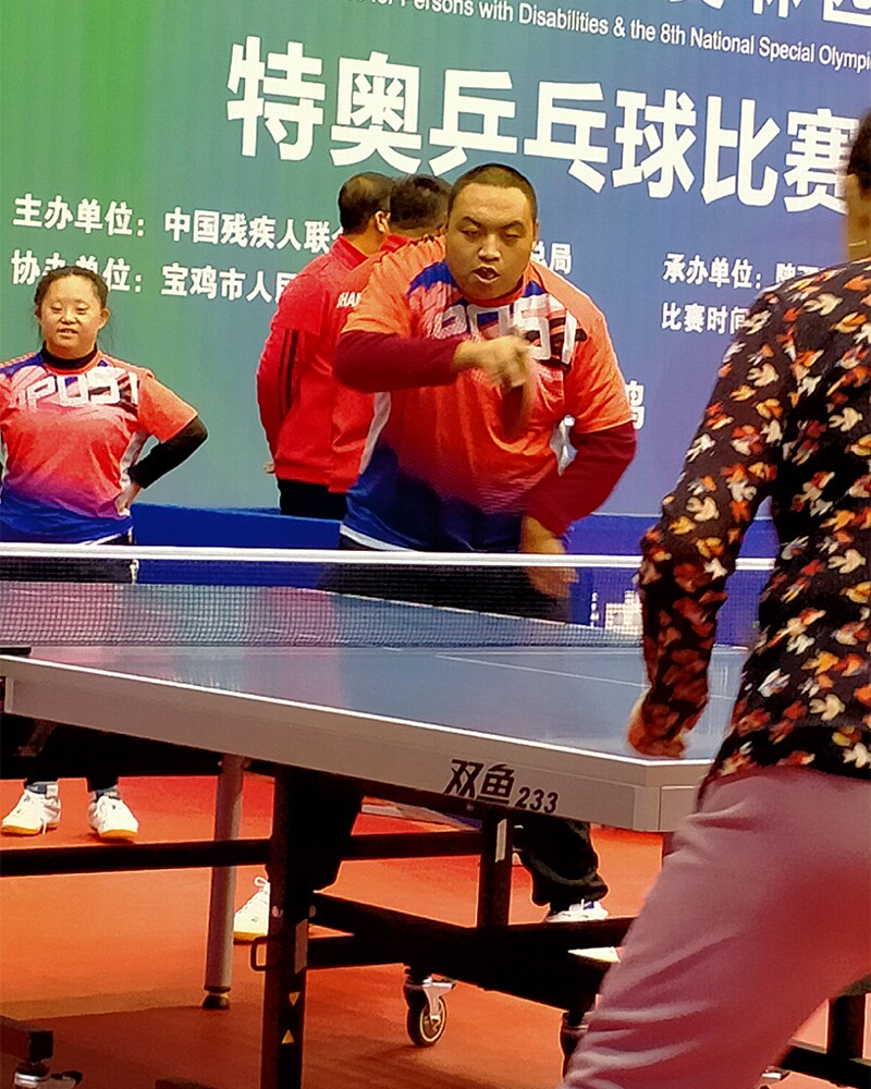 Xu playing table tennis. 