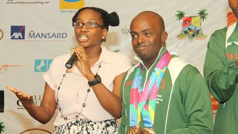 Adedamola and his sister Princess on stage at the Special Olympics World Games Los Angeles 2015 welcome ceremony.