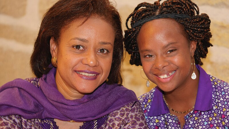 Rajah Sy on left with daughter Khadija, a Special Olympics Senegal athlete.