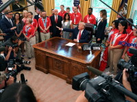 U.S. President Donald Trump, center, speaks during a meeting with members of the delegation that represented the USA at Special Olympics World Games Abu Dhabi 2019 in the Oval Office of the White House in Washington, D.C., U.S., on Thursday, July 18, 2019.