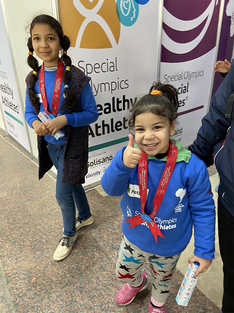 A young athlete gives a thumbs up after a screening.
