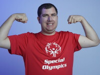 Greg flexing his muscles. 