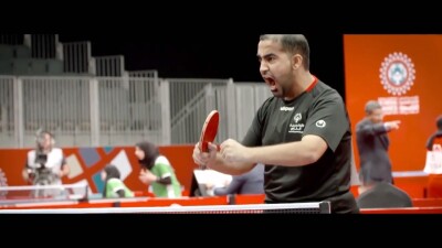 Young man excited to play ping pong. 