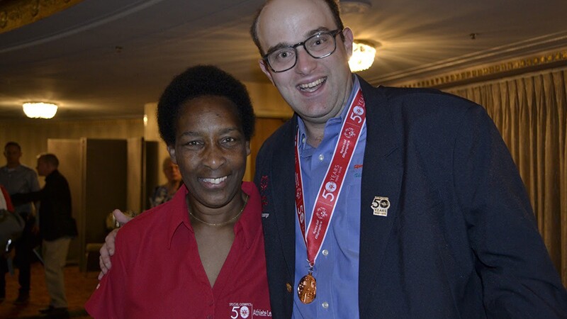 Loretta Claiborne (left) poses with Daniel Smrokowski in Chicago, IL at the 50th Anniversary of Special Olympics in July of 2018.