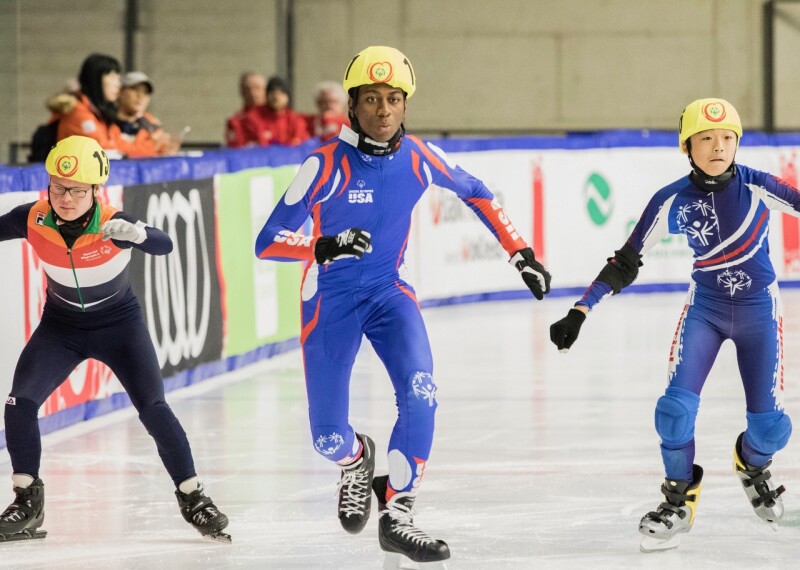 Athletes speed skating