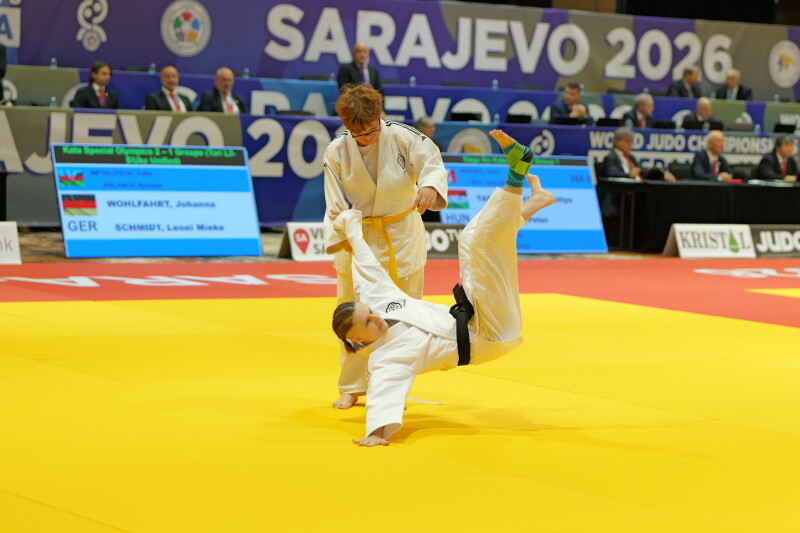 Two judokas performing Kata on the tatami.