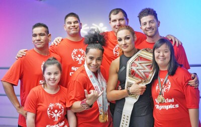 School of Strength Athletes pose with WWE Superstar Becky Lynch 