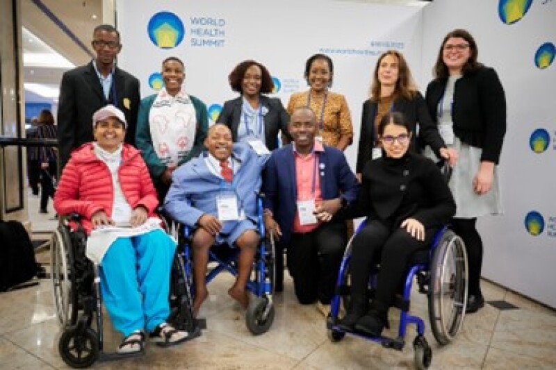 Members of the delegation of self-advocates with disabilities pose for a photo.