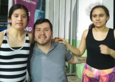 Ruben with two young women.