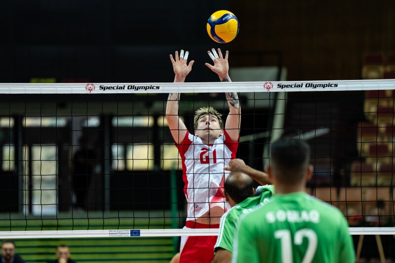 Krystian Fąfara hits the ball during a game against Iraq