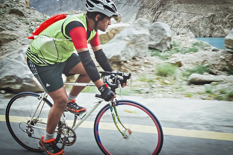 Haseeb Abbasi rides his bicycle.