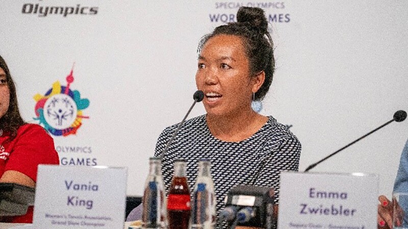 Vania King sitting at a panel discussions answering questions