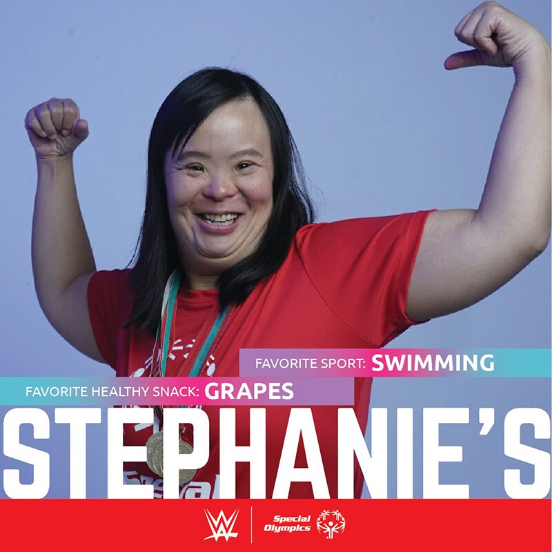 Stephanie Ching flexing her biceps.
