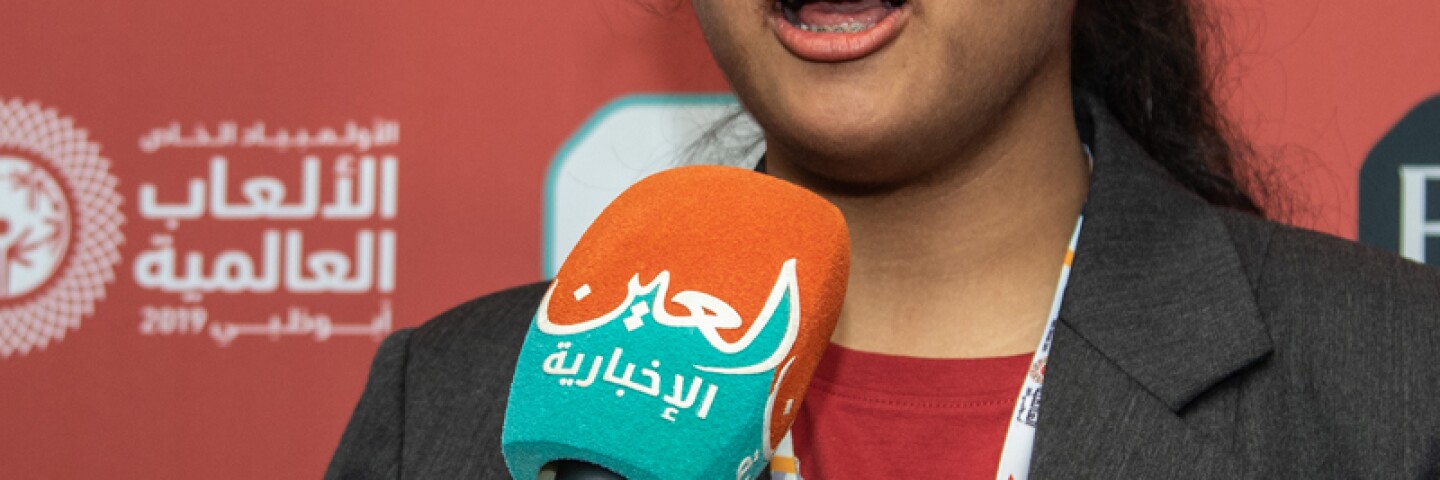 Young woman being interviewed.