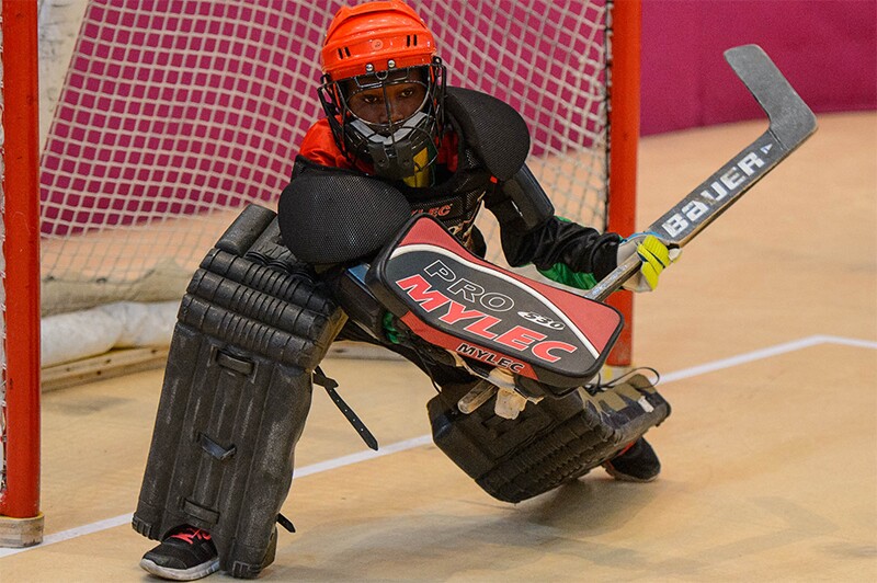 Lawrence Mwangi playing keeper and guarding the goalie's net.