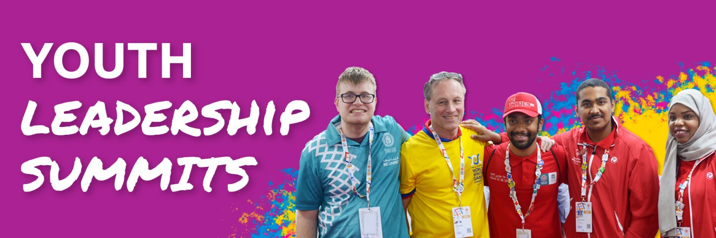 A group of people pose for a photo during a Youth Leadership Summit