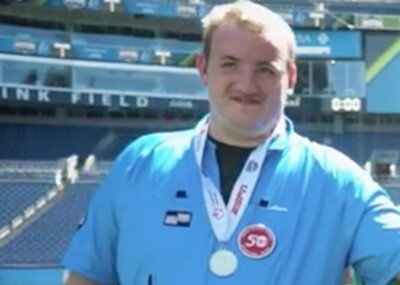 Garrett wearing a medal.