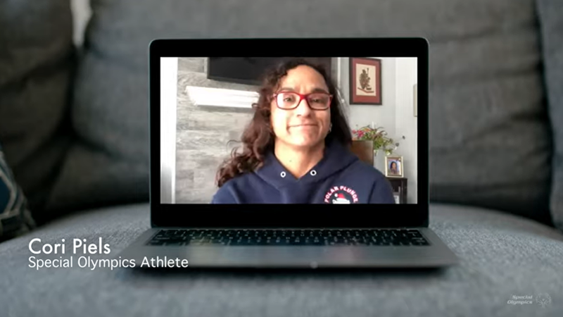 Cori Piels video interview plays in a tv monitor.