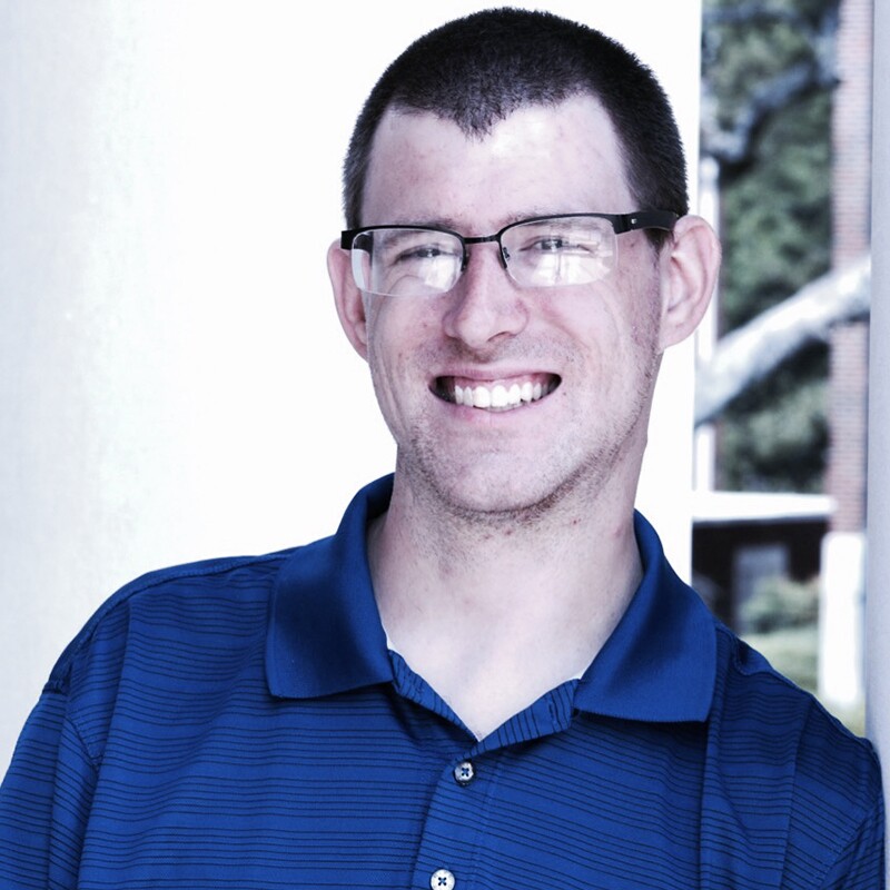 RJ Nealon in a blue polo.