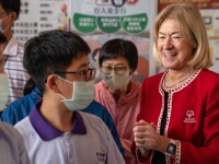 Mary Davis visiting with students. 