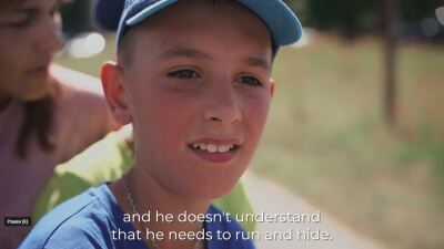 Young boy with a hat on