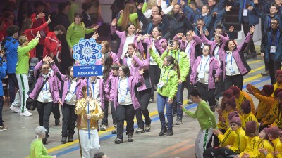 Delegation of Special Olympics Romania athletes marching into the stadium at the Opening Ceremony of the World Winter Games Turin 2025.