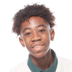 Jordan Adeyemi smiling for a professional headshot.