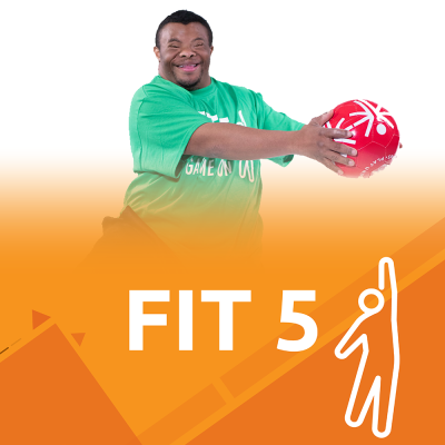 Young man kneeling down and working out with resistance bands.