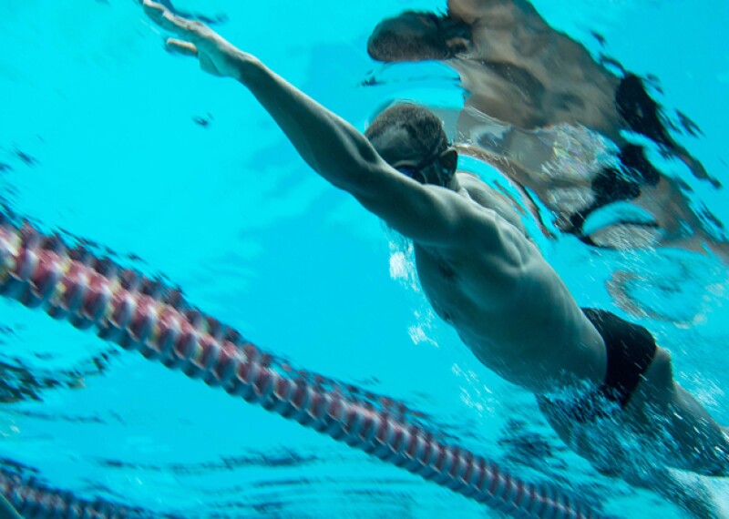 Athlete swimming under water.