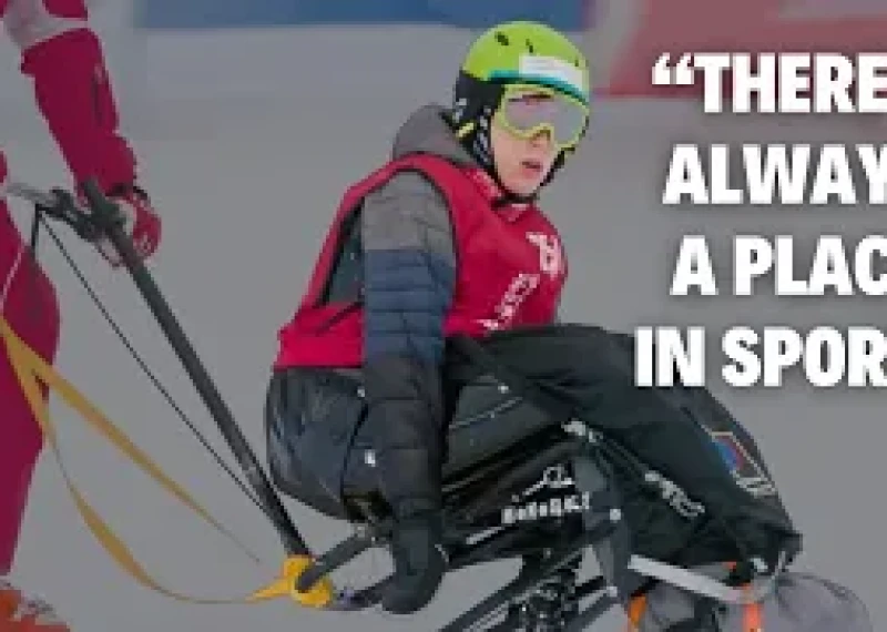a person on a ski apparatus for a disabled person, and a person behind him guiding it downhill. text reads: "there's always a place in sports." 