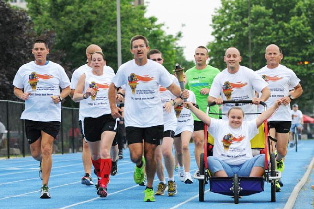600x400-Running-with-the-Flame.jpg