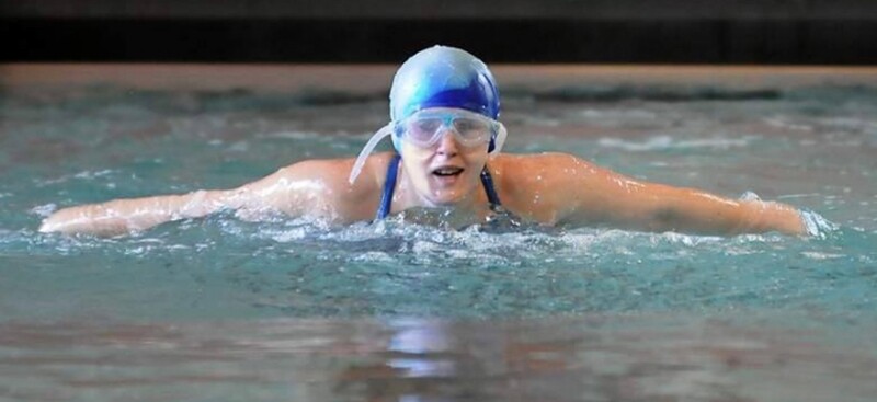 Abby Resnick competing in a swim competition.