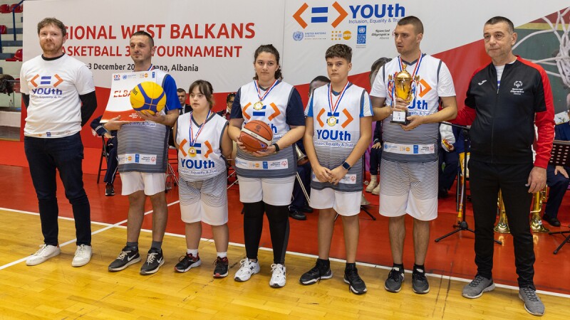 Special Olympics Albania basketball team posing for the camera