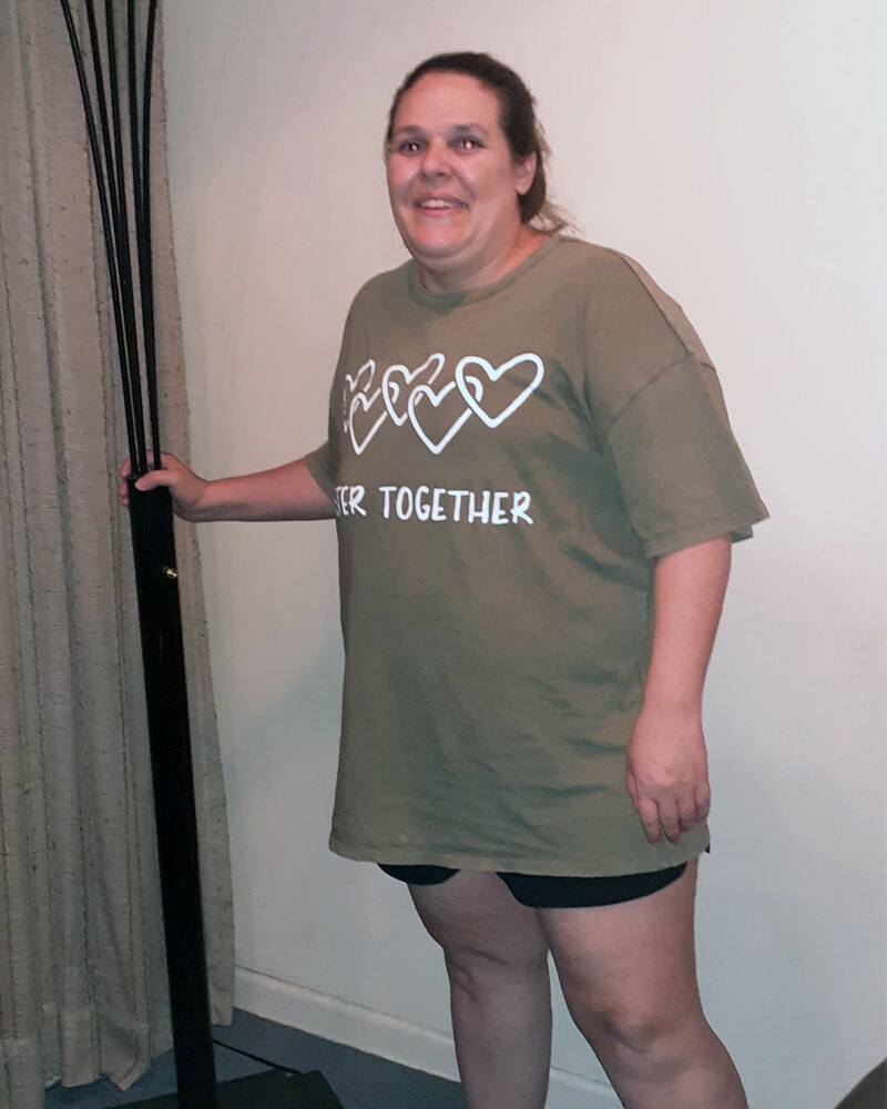 Kristin Short in a green Better Together t-shirt.
