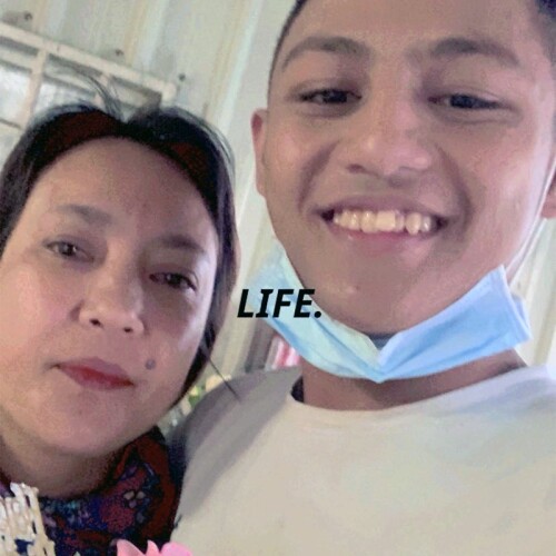 You-Xian Lin and his mother, Yu-Hui Lin smiling for a selfie together