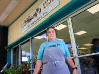 Baker in front of bakery story