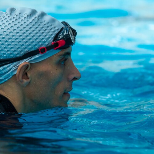 Swimmer swimming in the pool. 