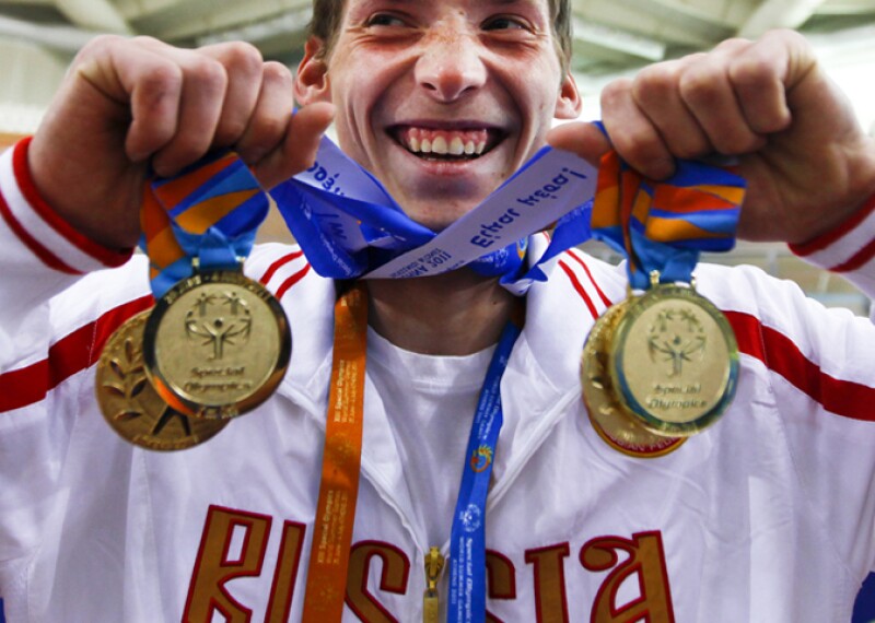 2011 World Games Athens, Greece, a Russian athlete celebrates his medals.