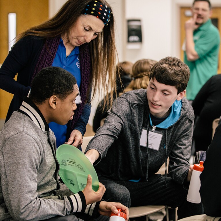 Thee people talking.