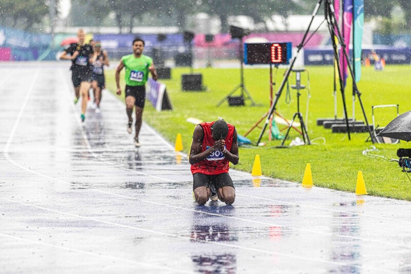 Athletes running in the rain